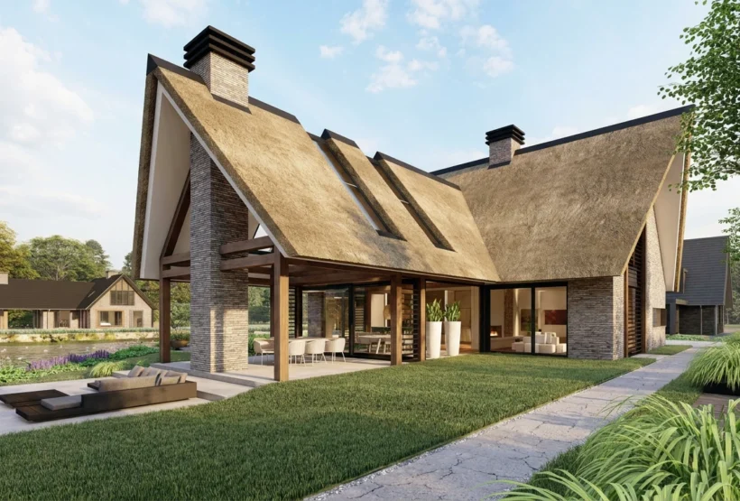 Tuinzijde van een rietgedekte woning aan het water, met een ruime overkapping, ontworpen door Bekhuis & KleinJan